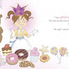 Whimsical art from "I Am Not a Princess!" by Schiffer Publishing, Ltd., shows a crowned girl and her bear among sweets and a frog, with playful text saying princesses don’t cook their own food.