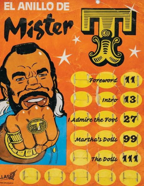 An illustrated "I Pity the Dolls" poster by Schiffer Publishing, Ltd. shows Mr. T with his fist forward and gold rings. Spanish text reads “El anillo de Mister T,” with a tracklist on a bright orange background—great for Mr. T fans and modern folk art lovers.
