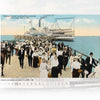A crowd in early 1900s attire walks on a dock from the Steamer Louise at Tolchester Beach, recalling classic Chesapeake Bay scenes—just like those featured in “Steamboat Days on the Chesapeake” by Schiffer Publishing, Ltd.