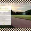 A brick path winds across a green lawn to a mansion at sunset, bordered by trees and signature MacKenzie-Childs black-and-white checks—inviting visitors to discover "Celebrating MacKenzie-Childs" from Schiffer Publishing, Ltd.