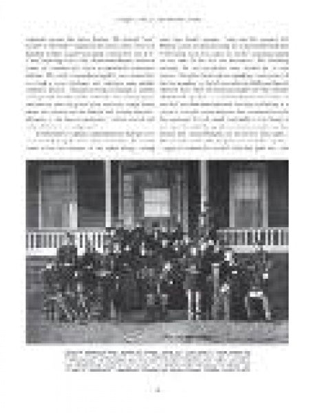 A page from "The Officer Corps of Custer's Seventh Cavalry" by Schiffer Publishing, Ltd. features two columns of text above a black-and-white photo of many people posed on a porch—likely frontier military leaders—and a caption below the image.