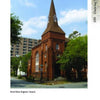 A striking red brick church with a tall steeple and arched windows stands on a corner, reflecting Savannah's historic charm. Featured in "Savannah Architectural Tours" by Schiffer Publishing, Ltd., it’s a must-see on any city stroll. Text: Beth Eden Baptist Church.