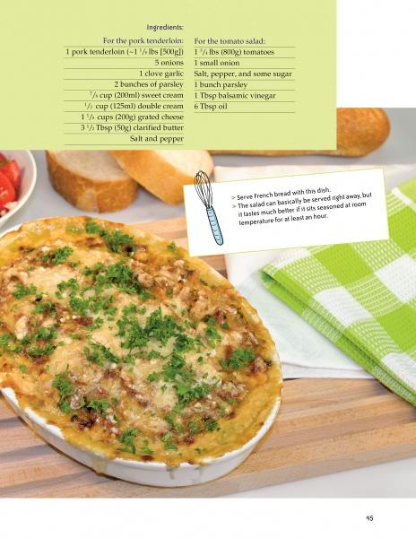 A baked pork tenderloin garnished with chopped herbs and served with bread and salad makes a perfect scene for "Today I Cook" by Schiffer Publishing, Ltd.—an ideal easy recipes feature for beginner cooks.