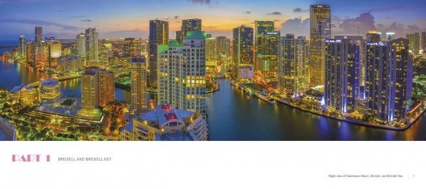 Miami At Night" by Schiffer Publishing, Ltd. captures tall, illuminated buildings reflecting on the water under a blue-orange sky, making it a striking addition to any cityscape photography book.
