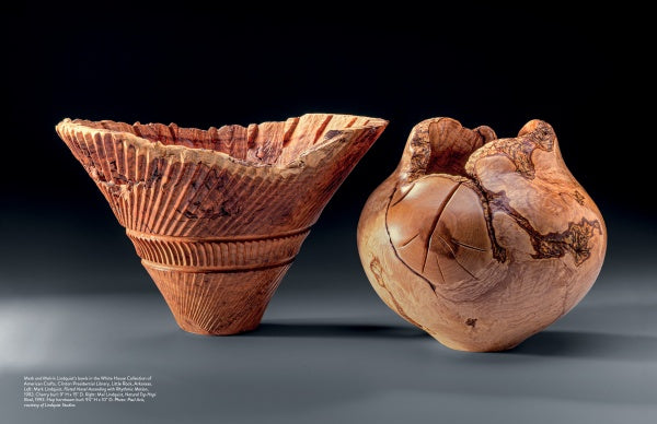The Lindquist Legacy by Schiffer Publishing, Ltd. features two intricately carved wooden vessels—one fluted and conical with textured ridges, the other rounded with natural cracks—displayed against a dark background.