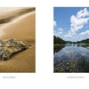 A two-page spread from Embracing Light by Schiffer Publishing, Ltd. showcases Acadia National Park: rocky shores, a sandy beach with a rock, lily-pad lakes, blooming flowers, clouds in blue sky, and a white house on Mount Desert Island.