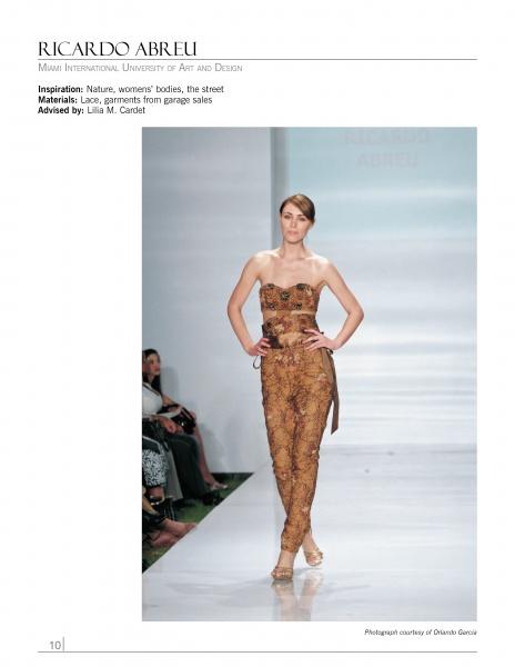A female model poses in a strapless brown lace jumpsuit on a white runway with a blue backdrop, highlighting Schiffer Publishing, Ltd.'s "Emerging Fashion Designers" and celebrating new talent in fashion.
