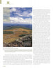 An aerial view from "New England's Natural Wonders" by Schiffer Publishing, Ltd. shows Mount Moosilauke’s rocky summit, alpine vegetation, winding trails, and distant forests beneath clouds, with hikers exploring the scenic landscape. Text surrounds the image.