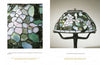 Close-up of the Tiffany By Design stained glass floral lampshade in pastels on the left; on the right, the full Schiffer Publishing, Ltd. lamp with a curved metal stand and the same classic Tiffany-inspired shade is displayed.