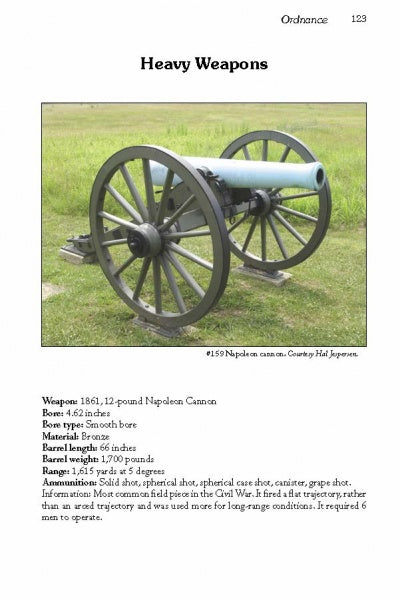 A replica 1861, 12-pound Napoleon cannon stands on the grass outside Fort Abraham Lincoln, recalling Civil War history. Weapon specs and historical details are displayed below. Product: Fort Abraham Lincoln by Schiffer Publishing, Ltd.
