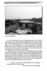 A black and white photo of Fort Mansfield, with arched concrete ruins among trees, illustrates “Rhode Island’s Spooky Ghosts and Creepy Legends” by Schiffer Publishing, Ltd., featuring tales of disappearing guns, military history, and local hauntings.