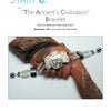 A bracelet with an ancient face centerpiece, black and silver beads, and intricate designs is displayed on a wooden hand. Text above reads, “Mixed Media Jewelry Techniques” by Schiffer Publishing, Ltd.—unique jewelry designs showcased.