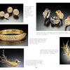A page from Schiffer Publishing, Ltd.’s *Art Jewelry Today 3* showcases six intricate gold pieces—earrings, rings, a bangle, brooch, and bird-shaped pin—each adorned with diamonds, sapphires, rubies, and tourmalines.