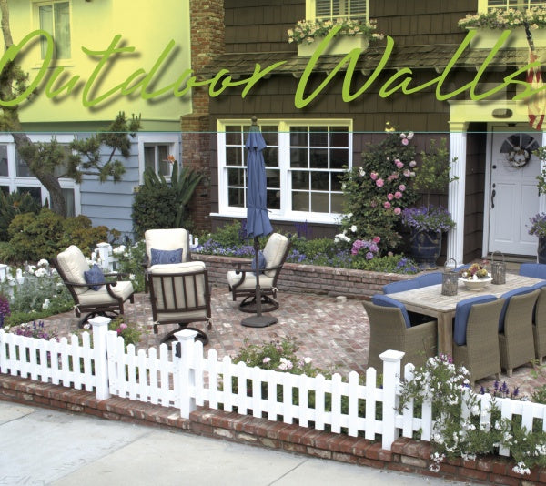 A cozy brick patio with cushioned chairs, a table, umbrella, and vibrant flowers creates charm, all framed by a white picket fence in front of a house. "Beach Boundaries" by Schiffer Publishing, Ltd. is overlaid at the top.