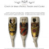 The European Porcelain Tobacco Pipe by Schiffer Publishing, Ltd. displays three ornate pipes with colorful coats of arms—shields, helmets, and crests—standing upright on a white background with descriptive text above and below.