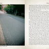 A spread from "Haunted Charlotte" by Schiffer Publishing, Ltd. shows a tree-lined street with scattered leaves on the left and mysterious tales of Charlotte’s haunted intersection told in text on the right.