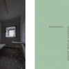 A two-page spread from The World of Urban Decay 2 by Schiffer Publishing, Ltd.: Left page—dim, empty prison cell with barred window and metal bed frames; right page—green background titled Introduction with two-column text.