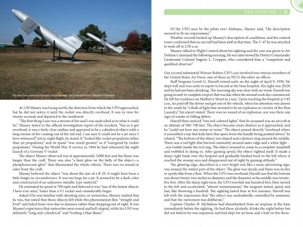 A photo from "Mysteries of Georgia's Military Bases" by Schiffer Publishing, Ltd. shows a white U.S. Air Force jet mounted upright on a grassy field, with a plaque and trees in the background under a partly cloudy sky.