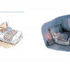 A child snuggles in bed with a toy rabbit beneath a patterned blanket in “The Wolf Will Not Come” by Schiffer Publishing, Ltd. Warm light fills the room as text reads: “Goodnight, my rabbit” and “Goodnight, Mom.” A soothing bedtime story.