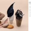 A collection titled "Contemporary Millinery" by Schiffer Publishing, Ltd. highlights exquisite craftsmanship and creative headwear design.