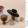 Contemporary Millinery by Schiffer Publishing, Ltd. features three sculpted hats—a purple brimmed hat with pink trim, a black flat-brimmed hat with a beige band, and a cream hat with white spirals—plus flat hat making patterns.