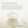 A white rowboat floats on calm water beneath a pale sky in "Healing Power of Water" by Schiffer Publishing, Ltd.—a striking black-and-white print exuding peace, with the boat’s mirror image and subtle text above and beside it.