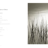 A sepia photo of tall reeds in calm water beneath a hazy sun, reminiscent of Michael Kahn, from "Martha's Vineyard" by Schiffer Publishing, Ltd. Features the poem "The Peace of Wild Things" by Wendell Berry in soft gray text on white.