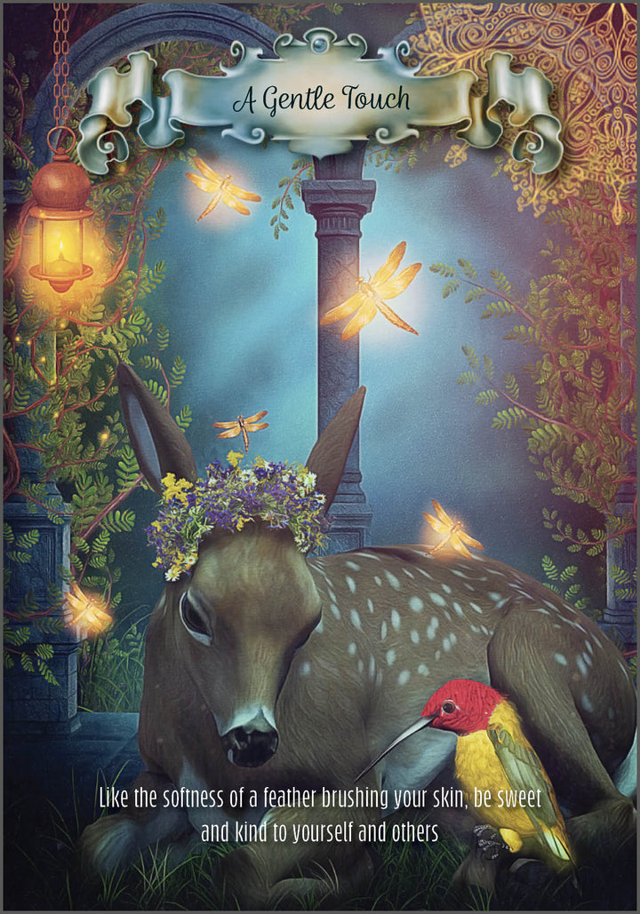 A gentle fawn with a flower crown rests by a red and yellow bird, aglow with fireflies in a lantern-lit forest. Text: Hummingbird Wisdom Oracle Cards by Schiffer Publishing, Ltd.—with affirmations for kindness and growth.