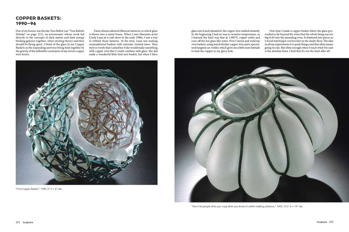 Two sculptural glass baskets evoking Josh Simpson's artistry—one frosted with green wire and copper mesh, the other ribbed white with green cords—are showcased. Featured in "Josh Simpson" by Schiffer Publishing, Ltd.
