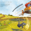 In "The Grumbletroll . . . Wants to Be First!" by Schiffer Publishing, Ltd., animals cheer as a bright orange soapbox car with numbers 2 and 3 speeds over a hill, while frogs, a rabbit, and a mole celebrate below in true sportsmanship.