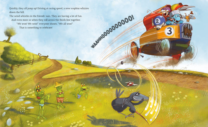 In "The Grumbletroll . . . Wants to Be First!" by Schiffer Publishing, Ltd., animals cheer as a bright orange soapbox car with numbers 2 and 3 speeds over a hill, while frogs, a rabbit, and a mole celebrate below in true sportsmanship.