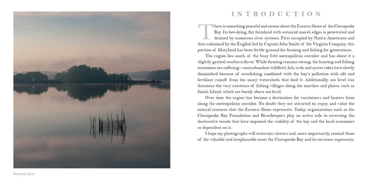 A calm dusk on Maryland's Eastern Shore shows still water reflecting a cloudy sky and trees, with wooden stakes rising from the bay. "Maryland's Eastern Shore" by Schiffer Publishing, Ltd. frames this scenic Chesapeake Bay photograph.