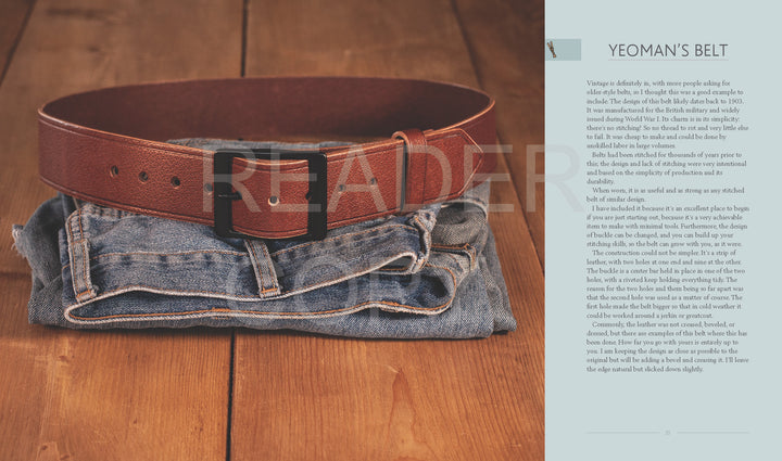 A copy of "A Guide to Making Leather Belts with 12 Complete Projects" by Schiffer Publishing, Ltd. rests beside a brown leather belt atop folded blue jeans, all placed on a wooden surface. A light blue title page with decorations appears to the right.