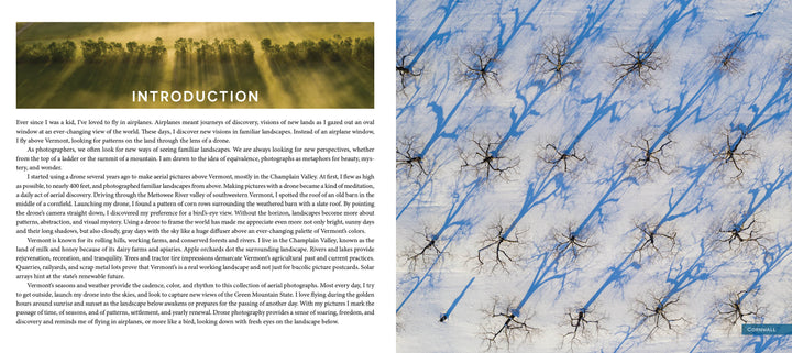 In Art from Above by Schiffer Publishing, Ltd., an Introduction page overlays a forest photo with long shadows, while opposite is Caleb Kenna’s aerial Vermont image of leafless trees casting blue shadows on snow.