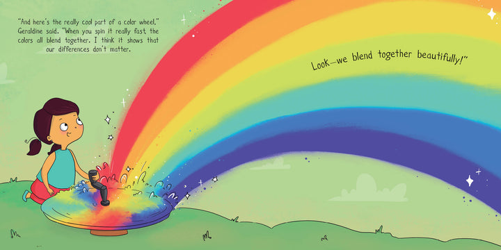 In "Geraldine and the Rainbow Machine" by Schiffer Publishing, Ltd., Geraldine spins a color wheel, casting a vibrant rainbow over green grass. Text: Look—we blend together beautifully! and our differences don’t matter, celebrating diversity in children’s books.