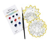 The Paint-Your-Own Holiday Decorations kit by Schiffer Publishing, Ltd. features a palette card, thin brush, and two animal-themed ornaments—a rabbit with flowers and a fox with a floral crown—on a white background.