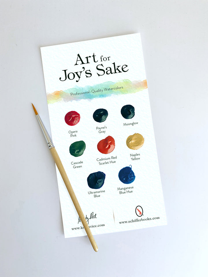 A sheet from Schiffer Publishing, Ltd.’s Paint-Your-Own Wall Calendar shows nine named watercolor swatches in various colors and a paintbrush—great inspiration for personalizing your own calendar.