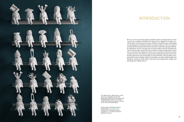 Rows of small white figurines inspired by Contemporary Black American Ceramic Artists from Schiffer Publishing, Ltd. sit on black shelves against a dark teal wall, each with unique headpieces and legs hanging over the edge. Text appears on the right.