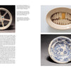 Three ceramic plates appear: a white wheel-shaped plate, an oval dish with beige accents, and a blue landscape plate—highlighting the talent featured in "Contemporary Black American Ceramic Artists" by Schiffer Publishing, Ltd.