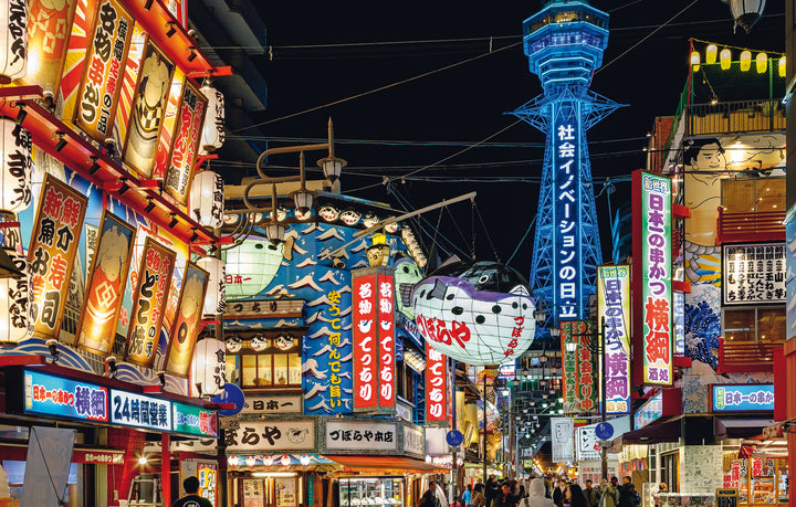 Experience the vibrant nightlife of Osaka, Japan, with colorful neon signs, lanterns, and bustling restaurants, as the illuminated Tsutenkaku Tower glows—featured in "Japan" by Schiffer Publishing, Ltd.