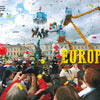 A lively Vappu crowd in Finland celebrates with confetti, balloons, and cranes lifting costumed revelers—featured in Schiffer Publishing, Ltd.'s "Useless Knowledge for the World Traveler," a fun pick for fans of global traditions and quirky travel trivia.