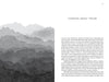 A grayscale page from Schiffer Publishing’s "The Razorblade of Zen" features the text THINKING ABOUT THEISM, left-aligned with gray watercolor mountains along the side and bottom, evoking Zen tranquility. Page 31 appears at the top right.