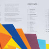 The table of contents page for "Modular Origami" by Schiffer Publishing, Ltd. features overlapping yellow, orange, and blue paper shapes at the bottom left, resembling origami ornaments, with clean sans-serif text on a light background.