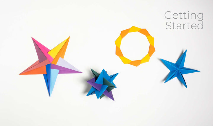Four vibrant origami models—a star, ring, spiked ball, and star—are displayed on white with "Getting Started" in gray above, highlighting customizable creations from Modular Origami by Schiffer Publishing, Ltd.