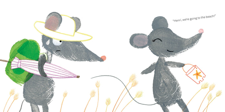 Two cartoon mice stand in a field. One wears a hat, green backpack, and holds a striped umbrella, the other smiles holding a bucket with a starfish. Text: "Henri, we're going to the beach!" From Lili at the Beach by Schiffer Publishing, Ltd.