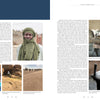 A magazine spread profiles "Inadan, the Mastery of Tuareg Artisans" by Schiffer Publishing, Ltd., showcasing photos of Eghawel Douga, Tuareg artisans at work, traditional attire, camels, and a teapot—capturing Sahara indigenous culture.